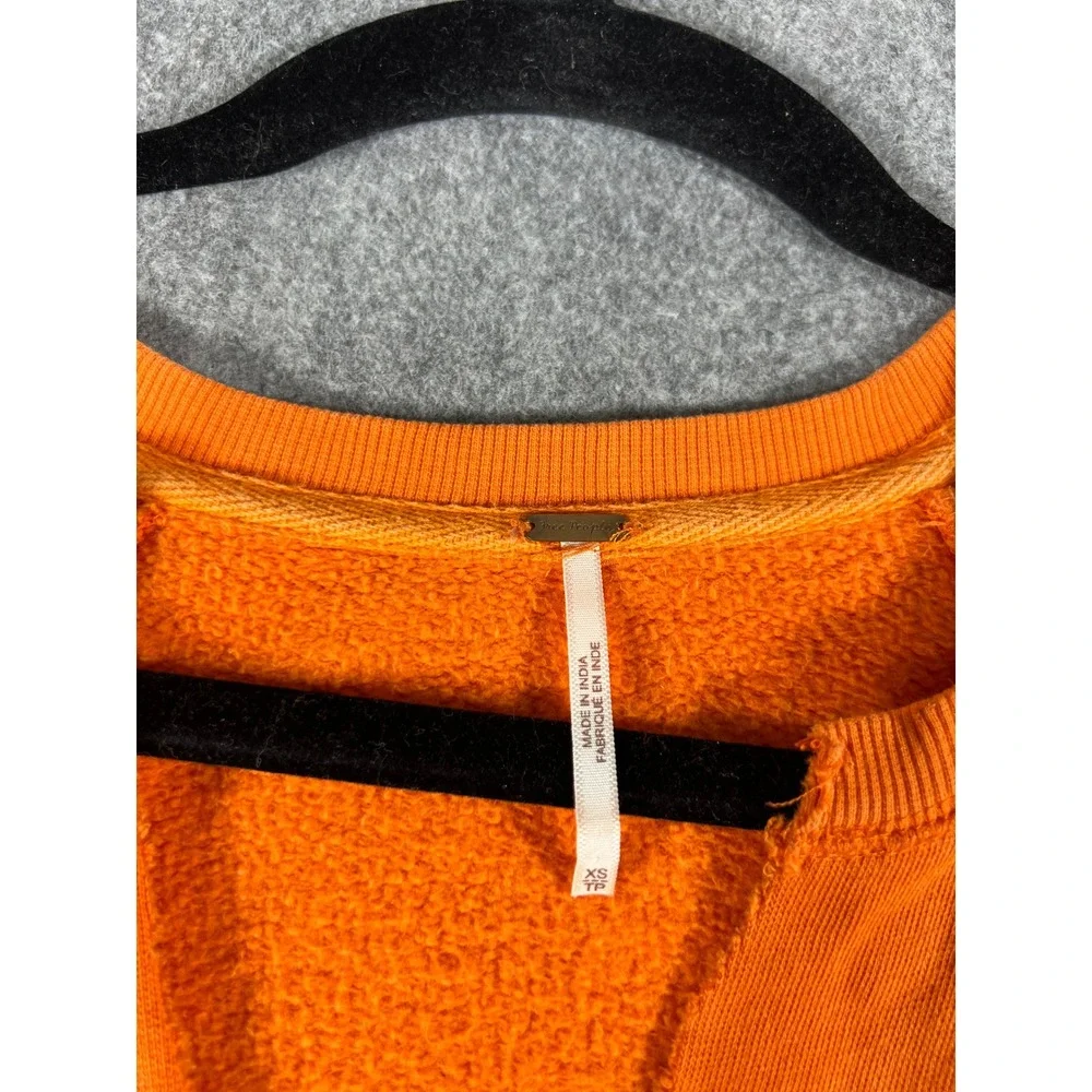 Free People Sweatshirt Womens XS Orange Fleece Lined Graphic Pullover Oversized